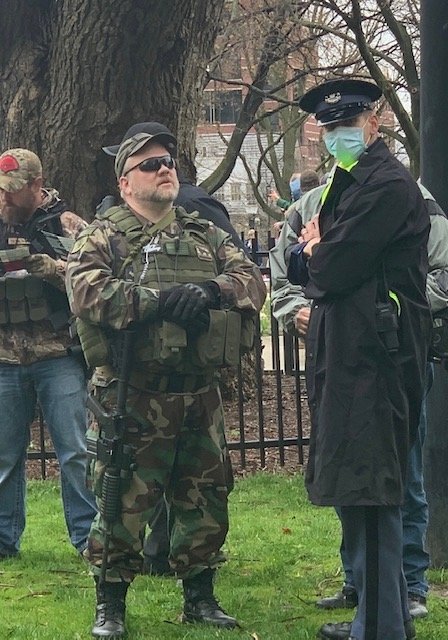 Armed protesters on the Capitol lawn on April 30 before  protesters moved into the Capitol.