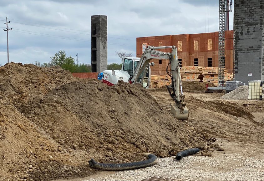 Construction continues today at the old Red Cedar Golf Course after the Michigan Economic Development Corp. greenlighted the developers' proposal for a tax break for the $256 million project. Developers reduced the project by $13 million in order to gain approval.