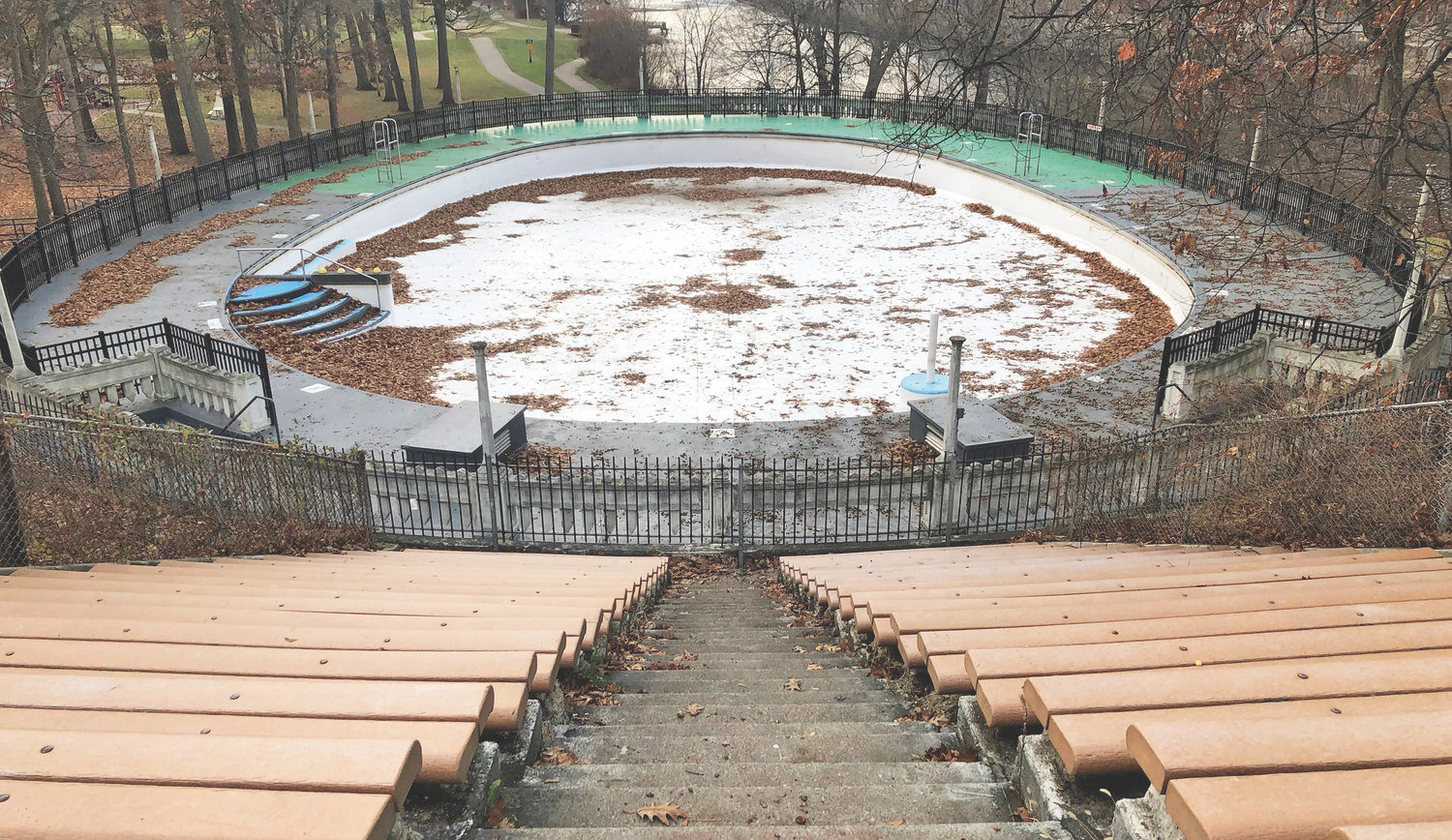 Park programs will be cut and the city’s two outdoor pools, including the one in Moores Park (left) will not open as Lansing struggles to stay solvent.