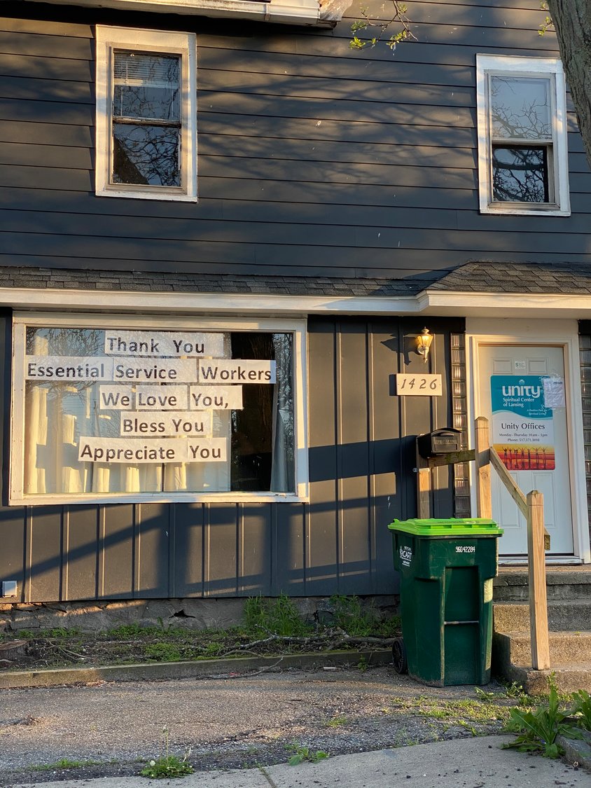 A sign in the window of the Unity Spiritual Center of Lansing, 1426 E. Michigan Ave.