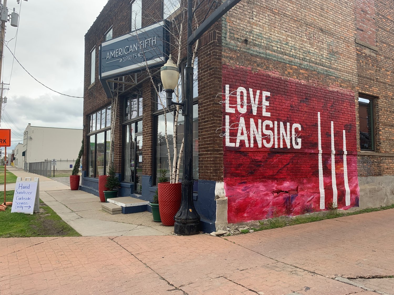 American Fifth Spirits,  112 N. Larch St., shows its love for Lansing. The bar and distillery sells hand sanitizer.