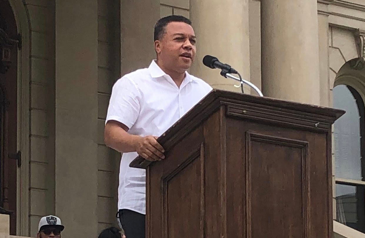 Lansing Police Chief Daryl Green, pictured here speaking at a civil rights rally at the Capitol Saturday, announced today that drivers will no longer be stopped for minor violations, such as a cracked window.