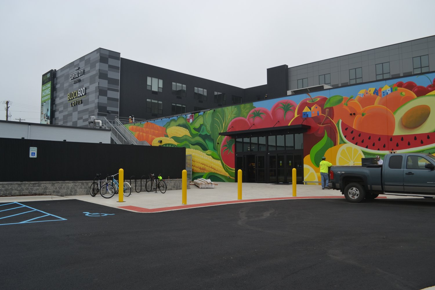 The back entrance of Capital City Market features a mural by Lansing artist Brian Whitfield.