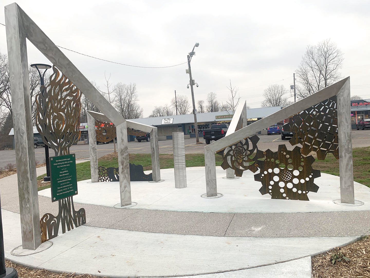 Encompass Lansing, designed by David Such and Fred Hammond, is installed on the corner of Pleasant Grove and Holmes roads.