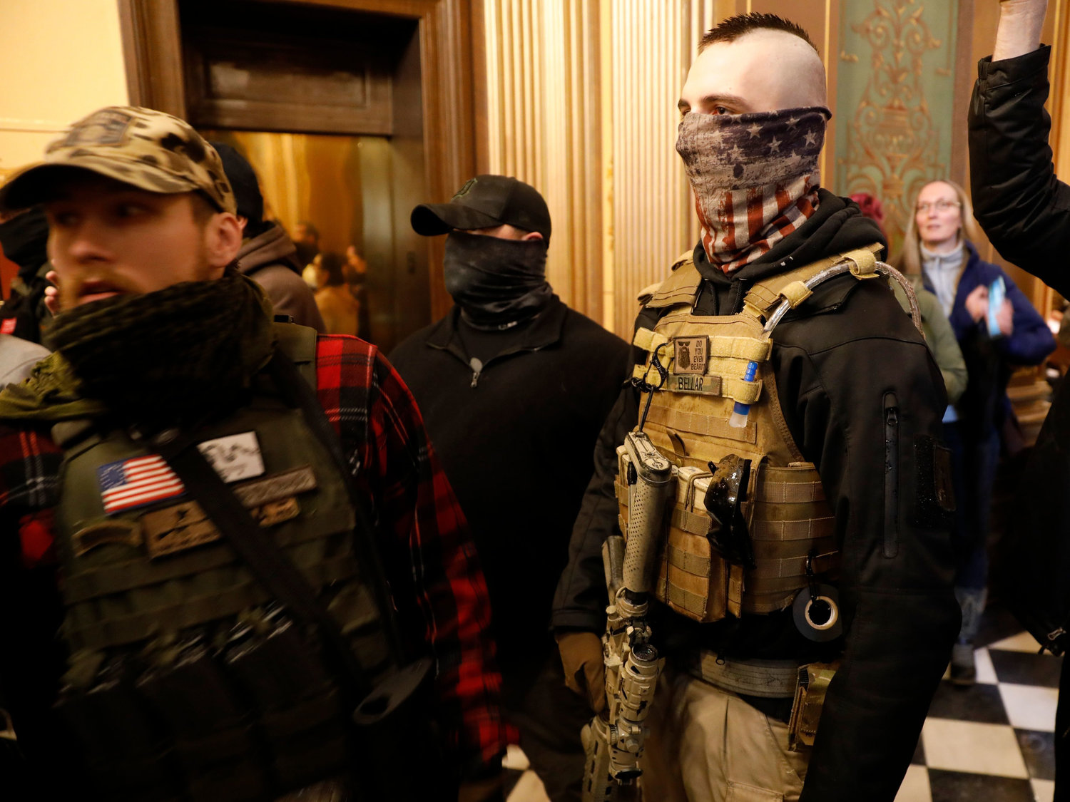 Armed militia members inside the state Capitol on April as part of a protest against Gov. Gretchen Whitmer's COVID-19 shutdown orders.