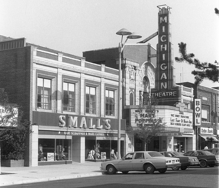 The lavish Strand Theatre, later the Michigan Theatre, at 215 N. Washington Ave., opened April 21, 1921. The theater was demolished in 1982, but the façade and arcade still stands.