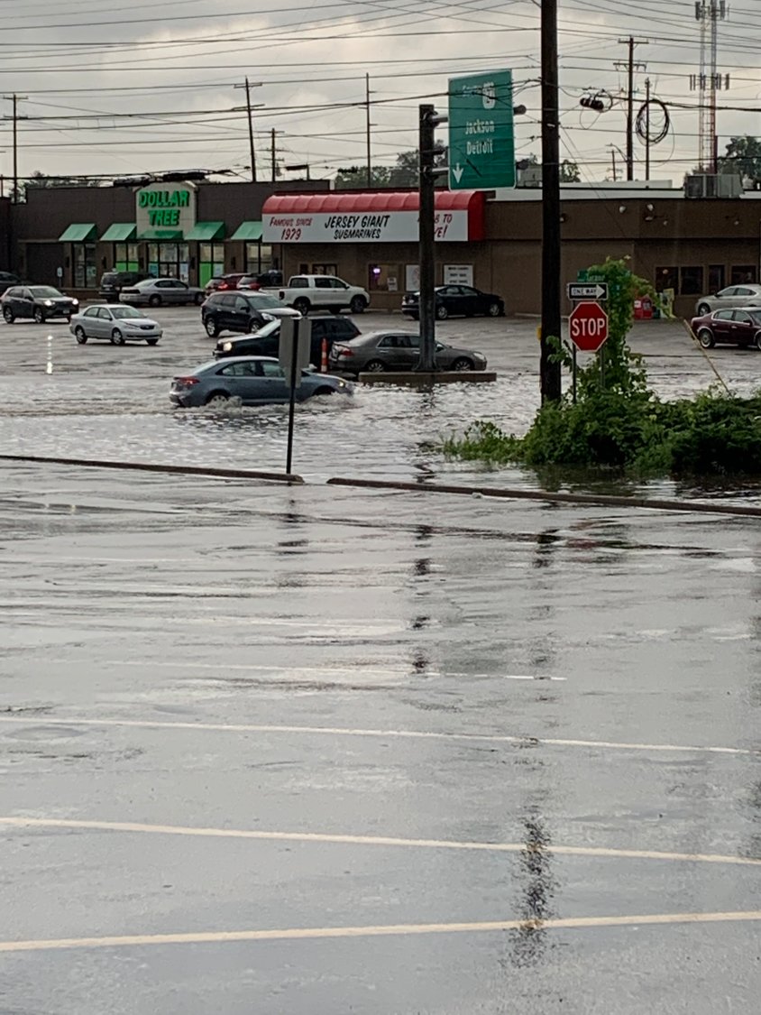 Cars in Frandor dealing with today’s torrential storm.  Ingham County Drain Commissioner Pat Lindemann said such flooding should be stopped by this time next year because of Montgomery Drain project he is in overseeing.