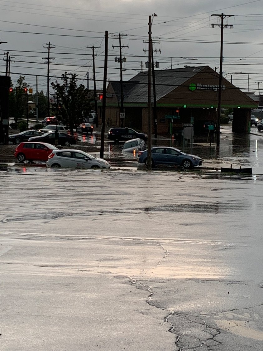 Cars in Frandor dealing with today’s torrential storm.  Ingham County Drain Commissioner Pat Lindemann said such flooding should be stopped by this time next year because of Montgomery Drain project he is in overseeing.