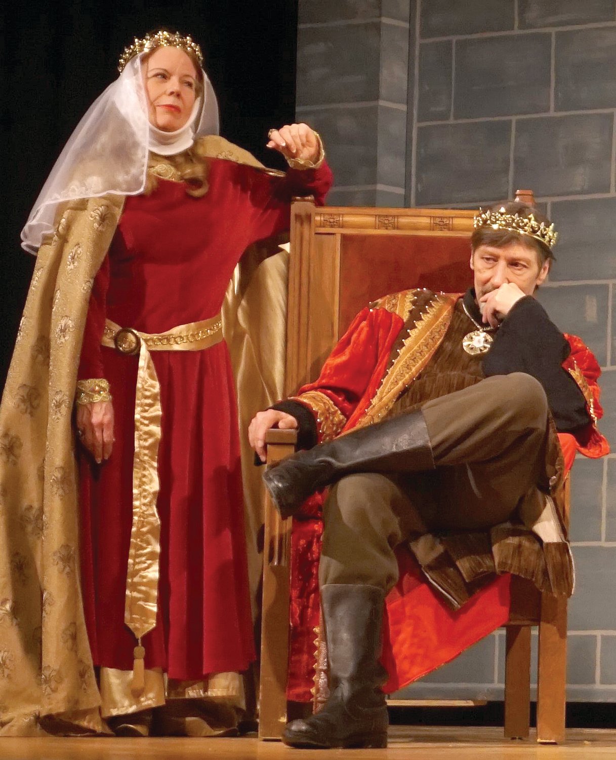 Kevin Burnham as King Henry II (right) and Tanya Canaday-Burnham as Queen Eleanor in Starlight Dinner Theatre's "The Lion in Winter."