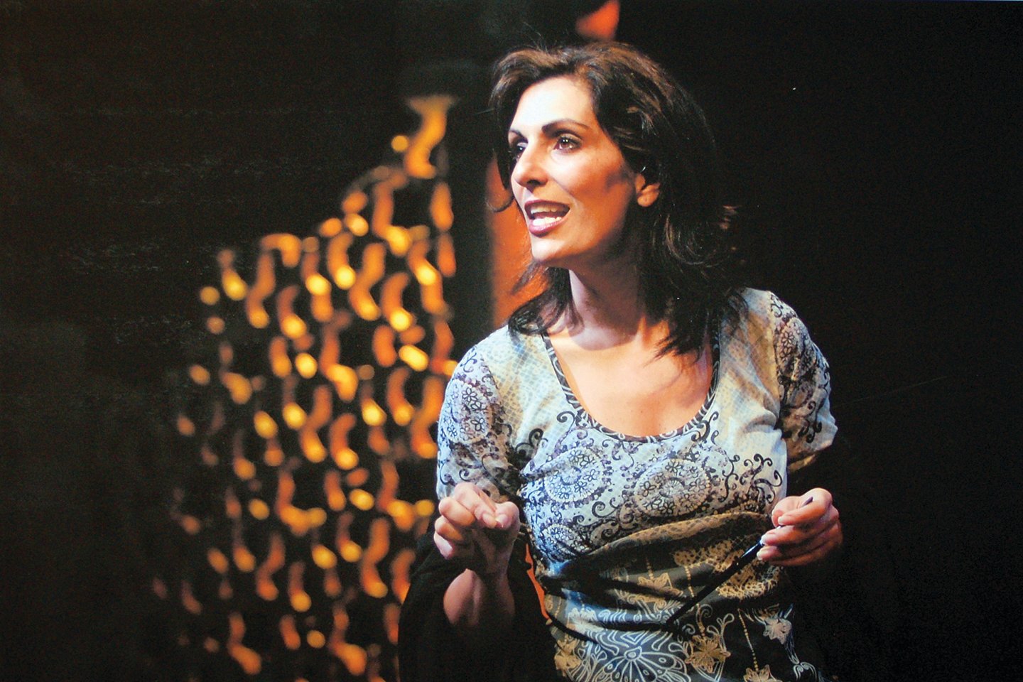 Sarab Kamoo in a production of “9 Parts of Desire” at the Performance Network.