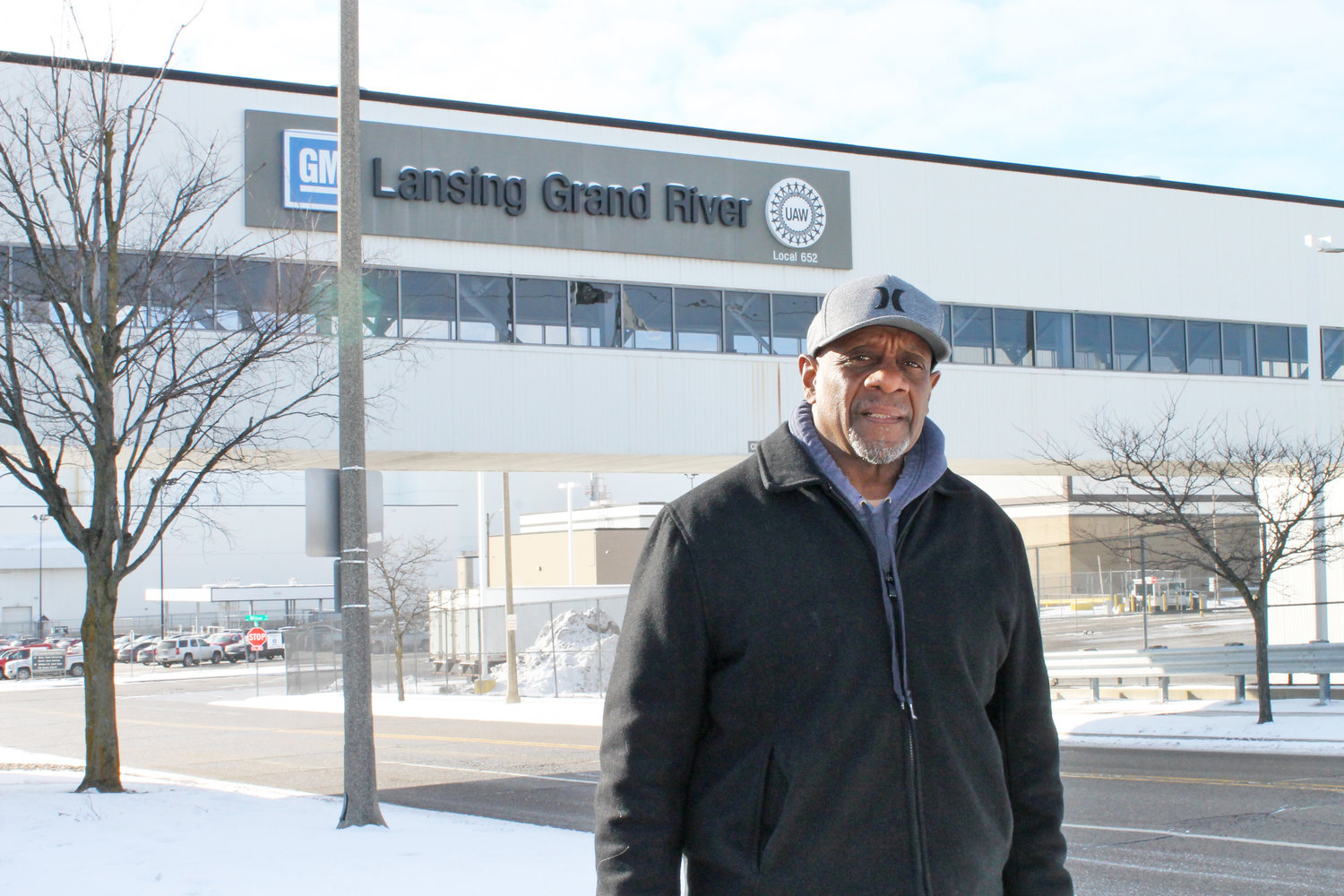 Art Austin in front of the GM Grand River Plant in downtown Lansing.