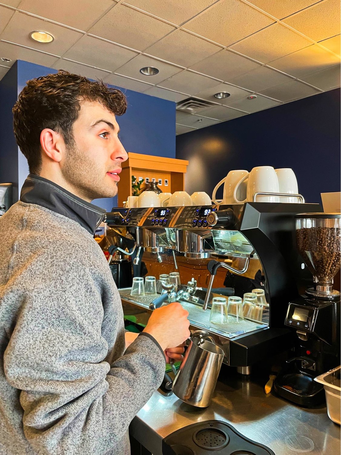 Tarek Chawich, 24, opened his coffee shop on Lansing’s west side last month.