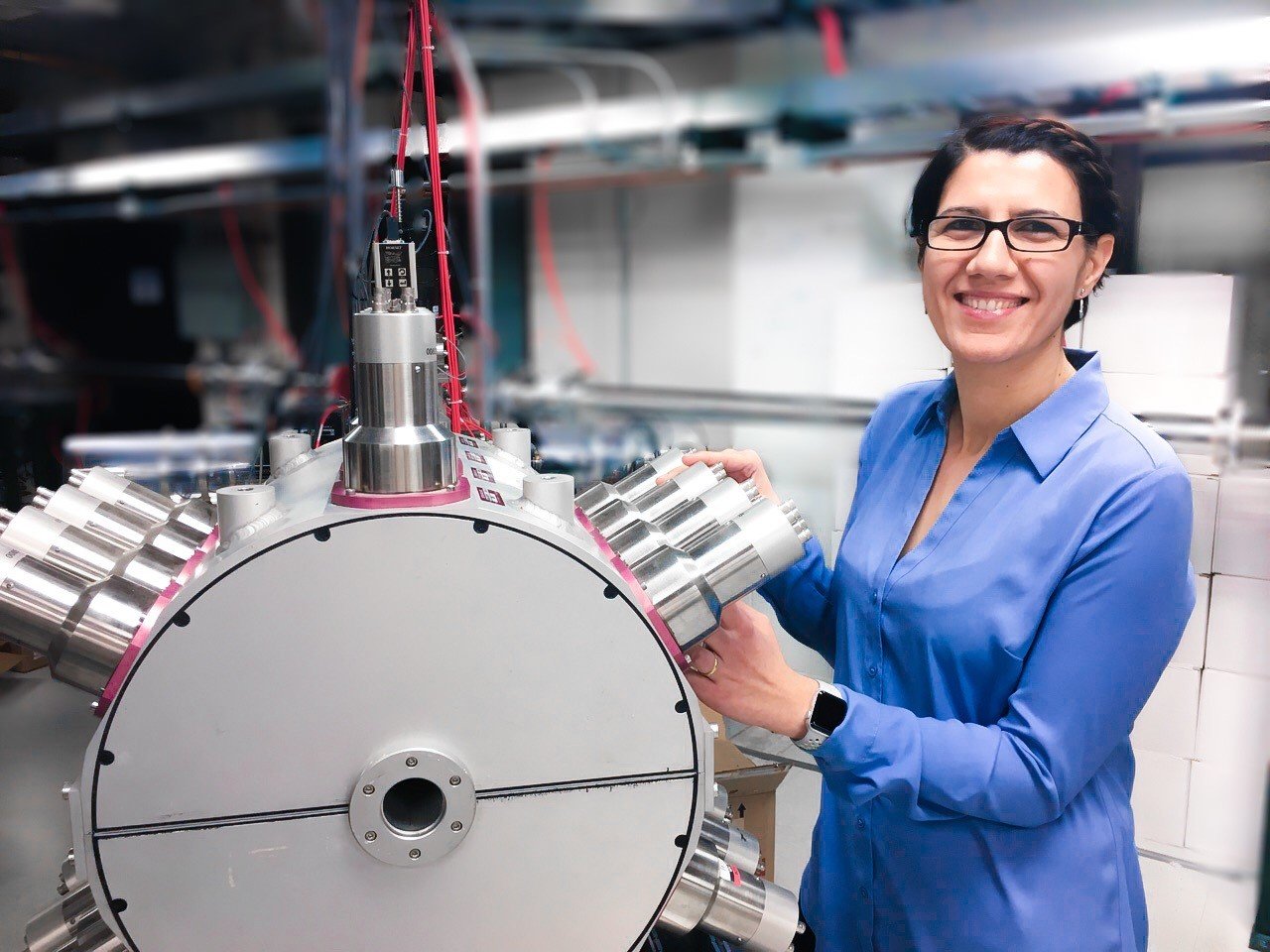 “We’re trying to understand how stars work, and how they create the elements,” said physics Professor Artemis Spyrou, shown here working on a gamma ray detector used to measure nuclear reactions.