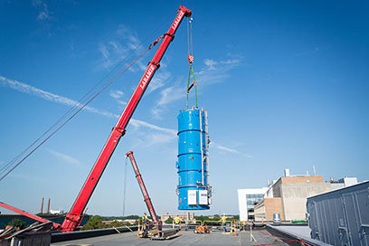FRIB’s 100,000-pound “cold box,” used to cool liquid helium to 60 degrees Kelvin, stopped traffic on Mt. Hope Avenue on its way from Oklahoma before being hoisted into place in August 2016.