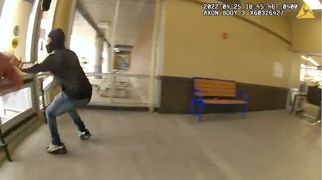 Body camera footage shows VanAtten running away from an officer near the front entrance.