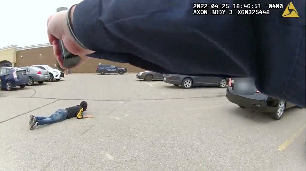 Body camera footage shows VanAtten collapsed on the pavement after being shot by officers.