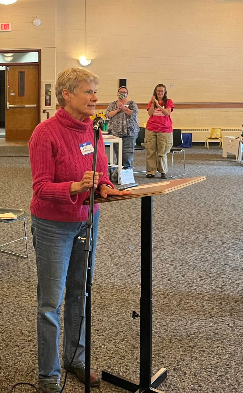 Ingham County Prosecutor Carol Siemon accepting the Peacemaker of the Year Award last week from the Peace Education Center.