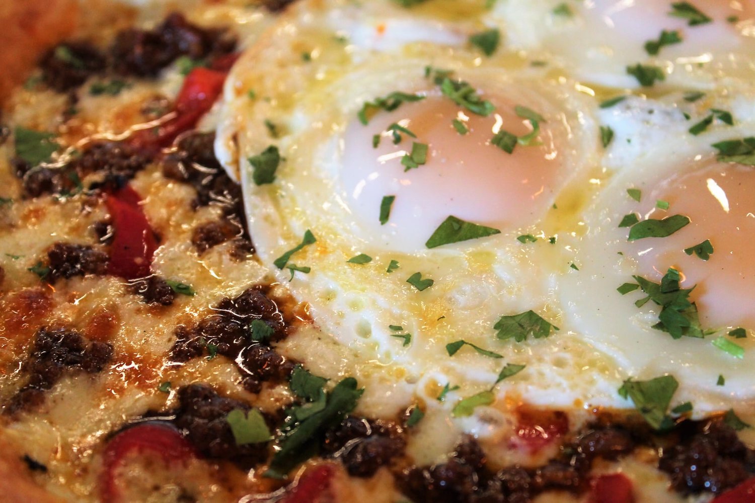This $15 pie has three eggs, spicy chunks of chorizo, and more.