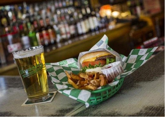 Dagwood’s burger special includes a burger, fries and a draft beer for just $6.