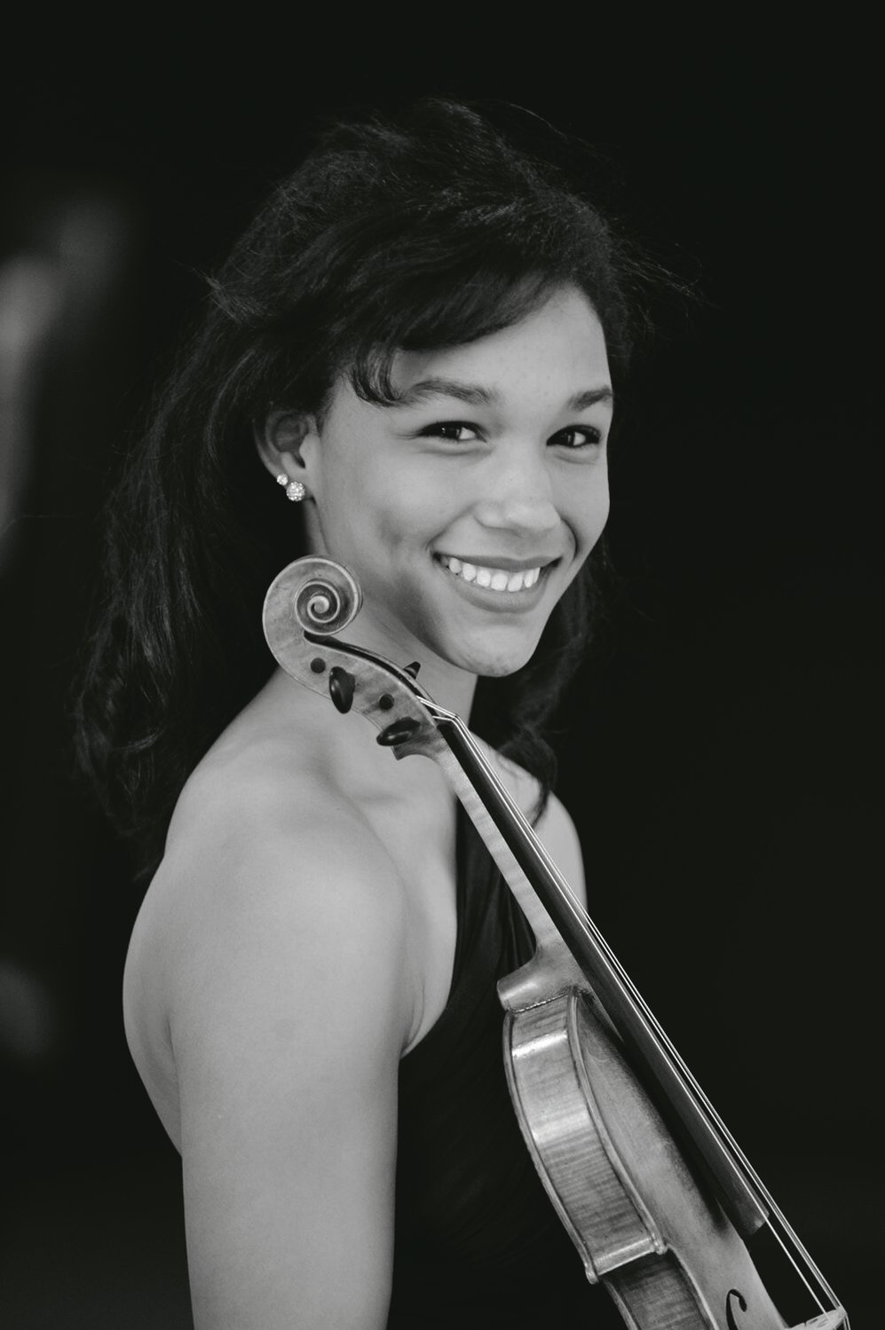 Violinist Adé Williams plays Samuel Barger’s violin concerto for the first time with the Lansing Symphony Orchestra Friday.
