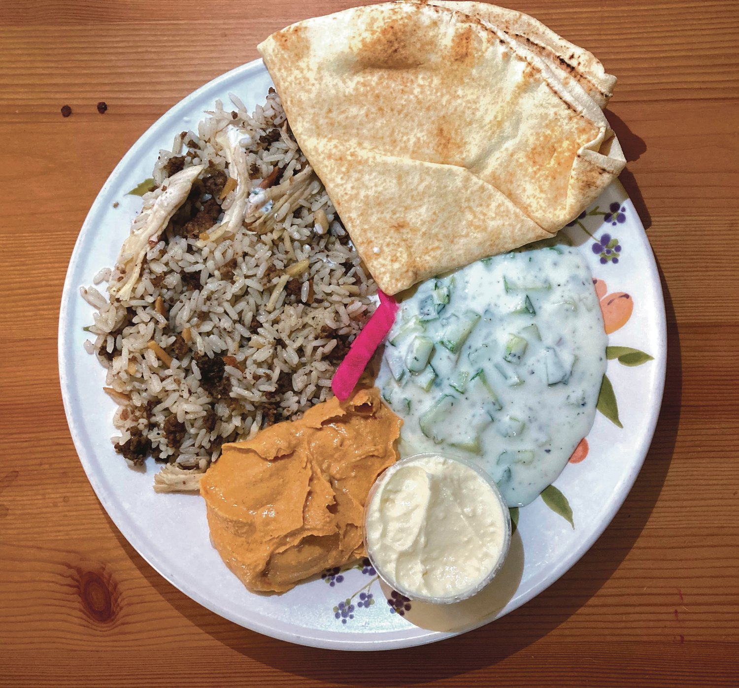 Hashwi Combo is a sizable meal that will leave you with leftovers, but you might want to order extra garlic sauce.