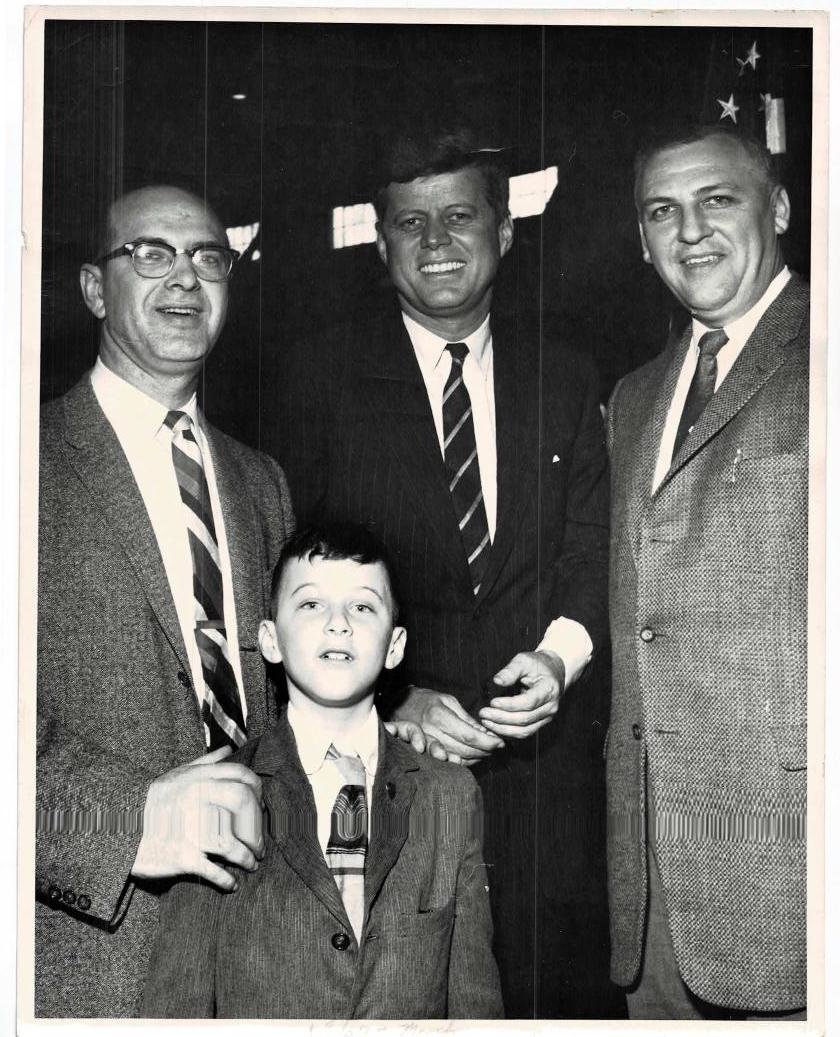 Robert Morris, 8, in 1960 with presidential candidate John F. Kennedy, his father, Ken (left), and another United Auto Workers official. Kennedy’s 1963 assassination is part of the plot of Morris’ book “Secret Service Journals: Assassination and Redemption in 1960s Detroit.”