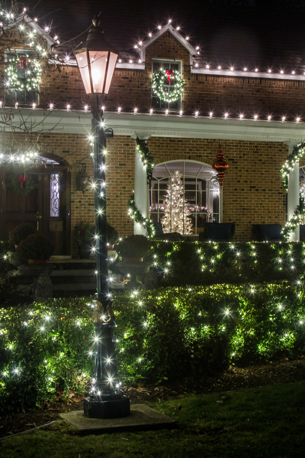The Glencairn neighborhood of East Lansing has many examples of holiday decorations that complement the historic architecture of the area.