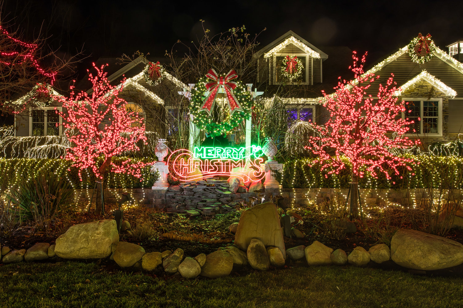 Visible from space?  Cheryl Underwood smiles as she admits her epic Christmas display is “a little over the top”.  It includes more than 150,000 lights and draws hundreds of visitors to Williamstown Township.