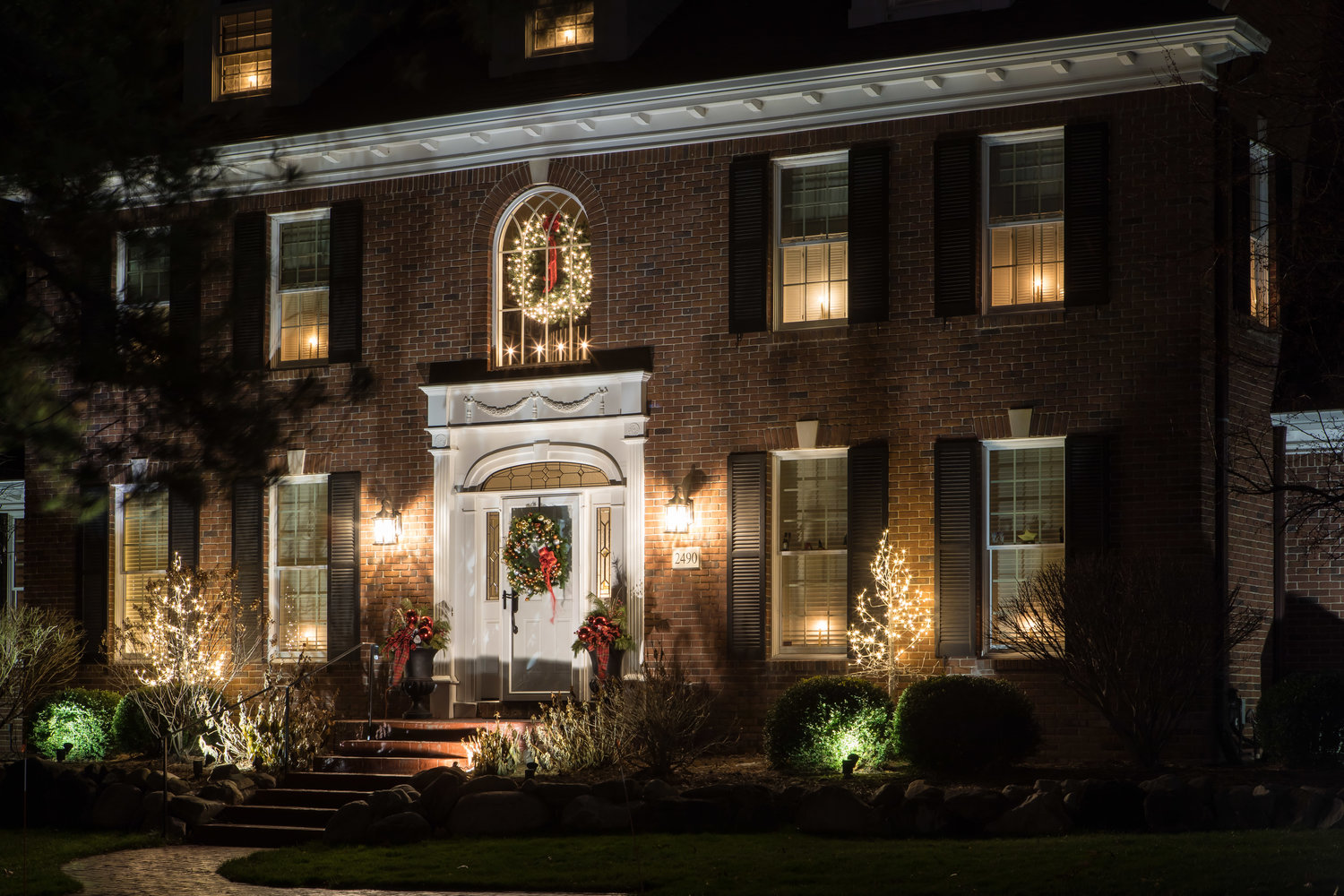 A traditional, understated display is how the James Hallan family captures the spirit of the season on Overglen Court in East Lansing.