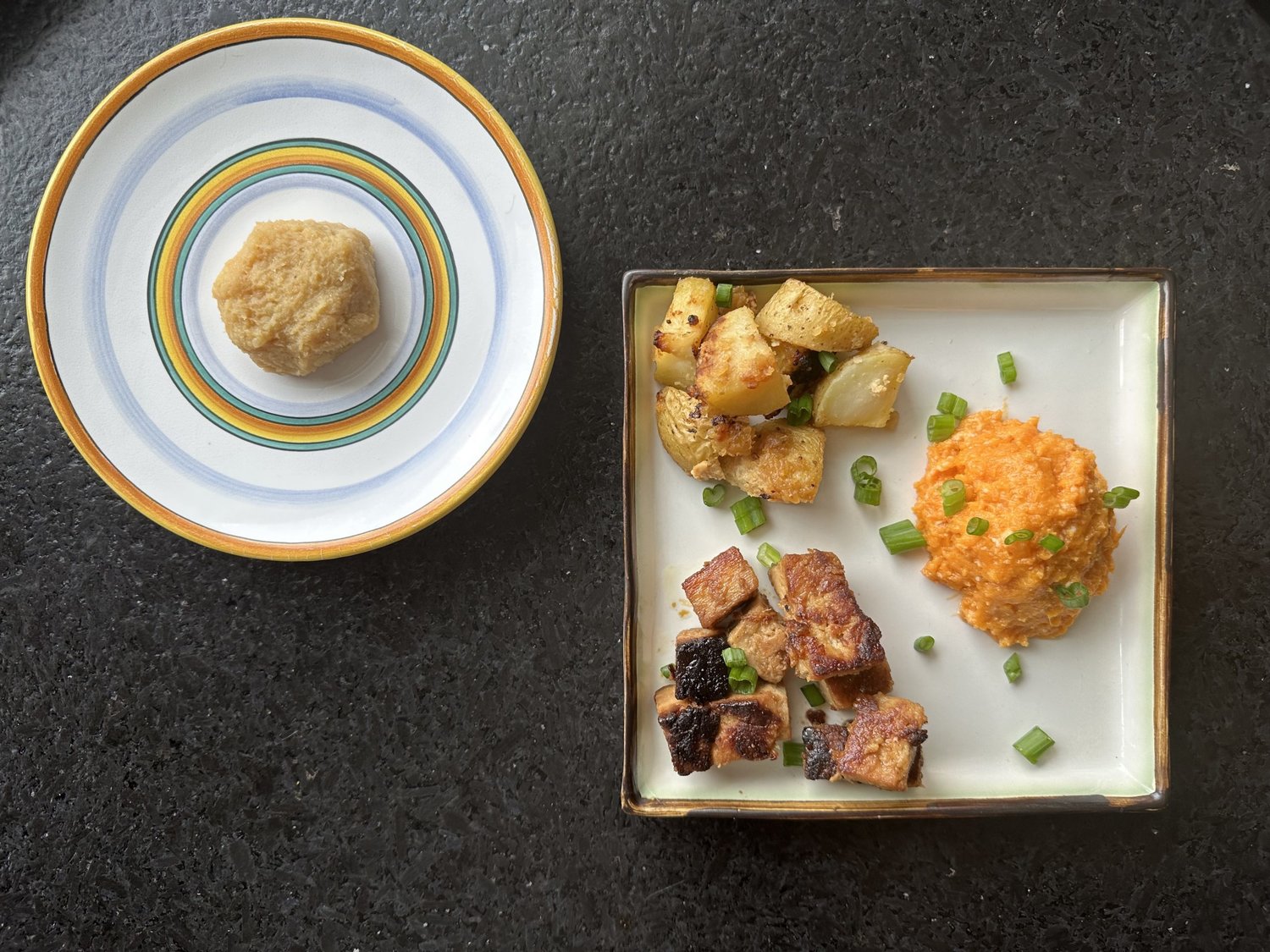 A trio of white miso dishes: fried tofu with ginger and garlic, miso butter-baked potatoes and mashed sweet potatoes with miso butter. On the round plate is a dollop of white miso.