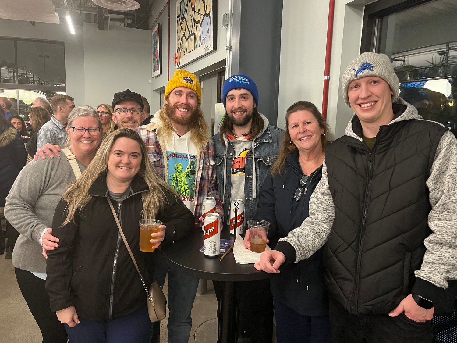 The Farr and Reynolds families enjoy drinks from the bar. “It’s nice to have something in the winter that’s inside,” said Andrea Farr (far left).
