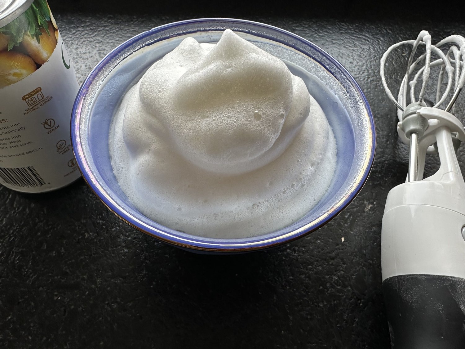Aquafaba, the leftover liquid in a can of beans, is a cheap egg substitute to use during the current shortage. You can beat it stiff like egg whites, use it in baked goods and even emulsify it into mayonnaise.