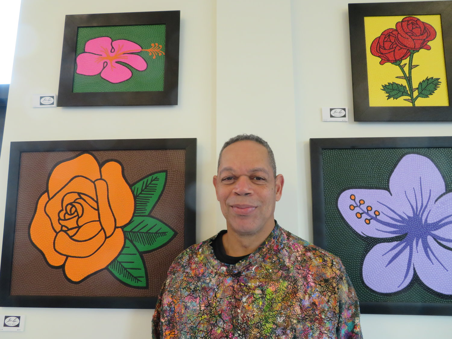 Snyder’s new floral-themed exhibit at Hooked café and bookshop was inspired by the work of Georgia O’Keefe.