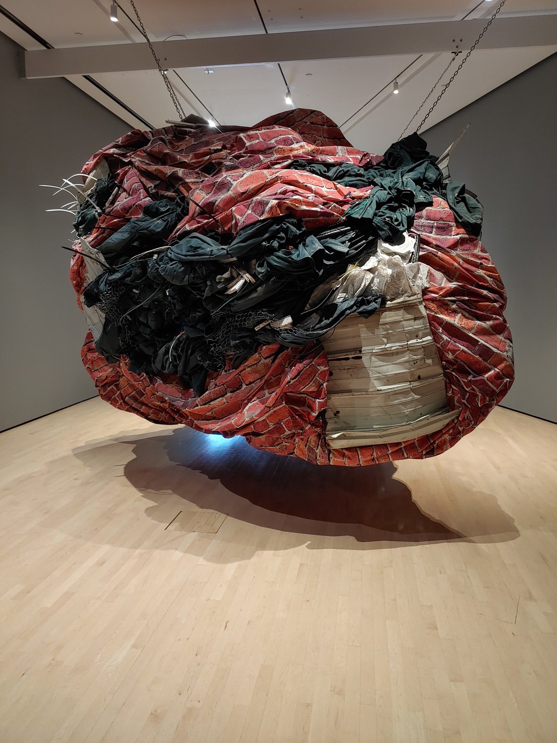 Keith LaMar, the subject and co-creator of “DIEGEST,” believes the carceral system is designed to break you down slowly and consume you like a digestive system. Artist Mia Pearlman molded prison materials such as brick, barbed wire and zip-tie handcuffs to resemble an enormous, organic mass representing this idea.