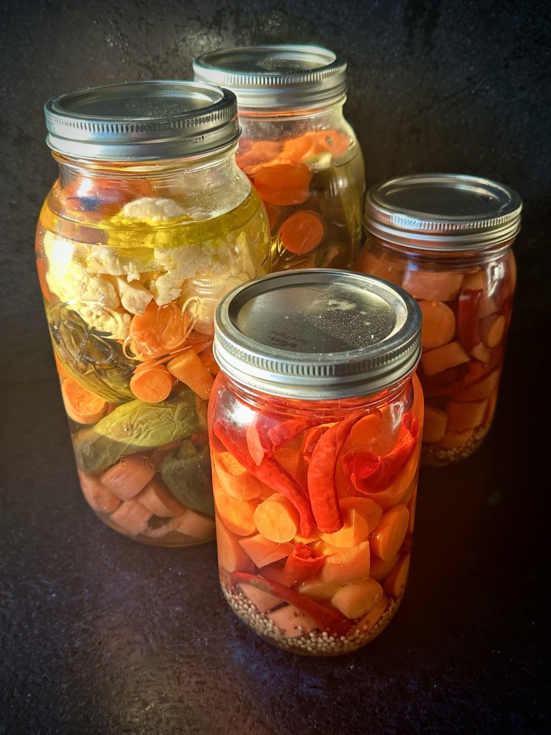 The hardest part of pickling carrots and peppers is not being able to eat them right away.