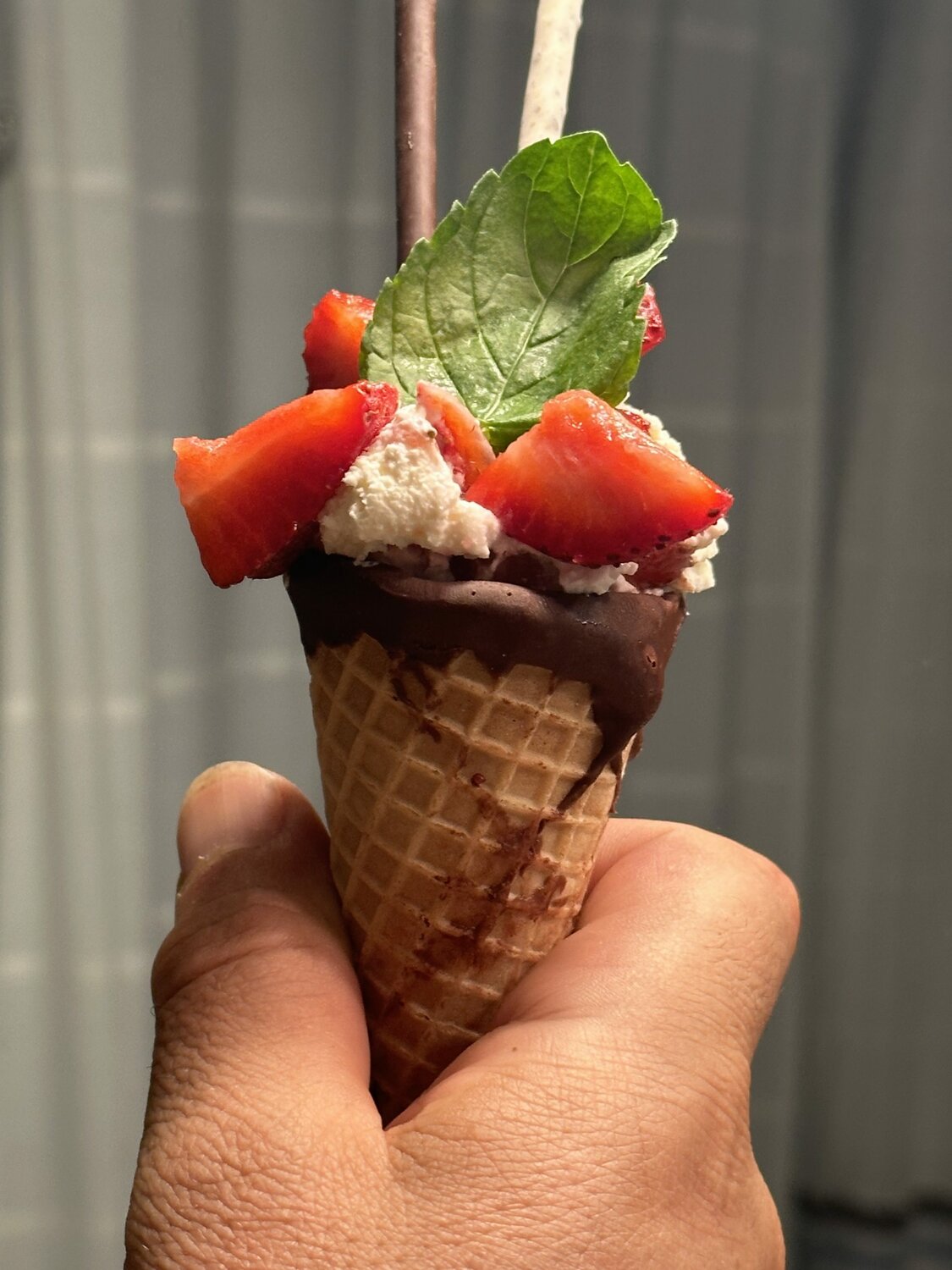 Chocolate-dipped, strawberry and ricotta-filled ice cream cones make a perfect treat for Mother’s Day.