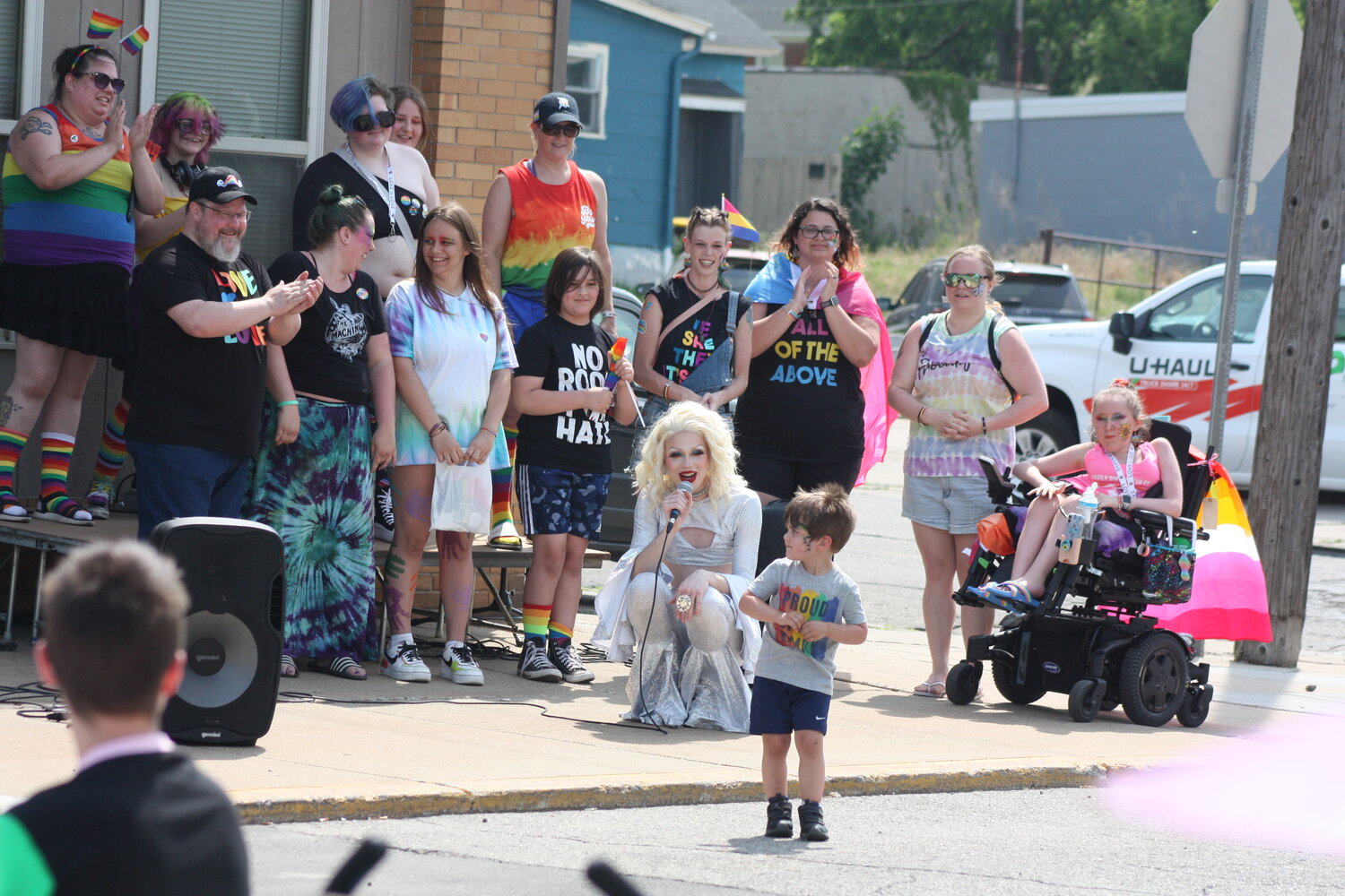Young Jake was the winner of the Pride Gear contest at St. Johns’ Pride Fest. He’s taking a walk to show off his t-shirt, while other contestants look on.
