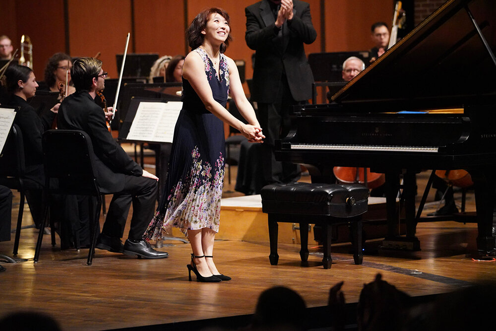Guest soloist Claire Huangci was all smiles after her performance of Maurice Ravel’s Piano Concerto in G major at Thursday’s Lansing Symphony Orchestra concert.