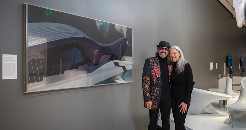 Art collector and chairman of the Broad Museum Board of Advisers Alan Ross and his wife, Rebecca, bask in the swooshes of a Zaha Hadid painting they donated to the Broad.
