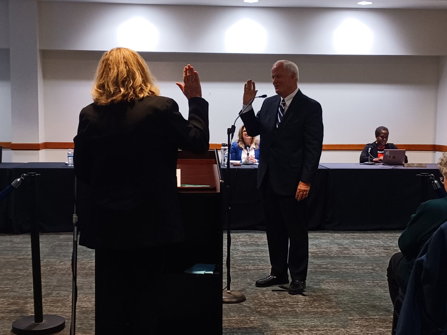 George Brookover takes his oath after the East Lansing City Council unanimously chose him as its next mayor yesterday.