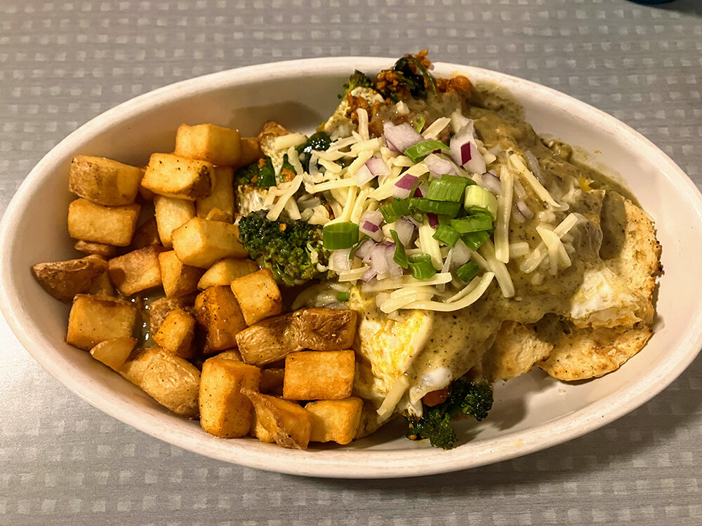 Good Truckin Diner’s Hippie Hangover is like a combination of eggs Benedict, biscuits and gravy, and Fleetwood Diner’s Hippie Hash.