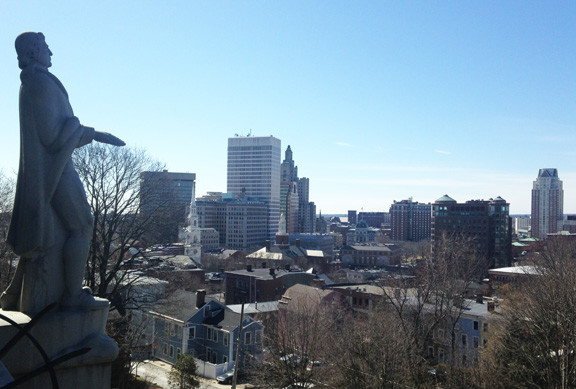 The iconic statue of Roger Williams overlooking Providence, at a time when numerous economic development visions are being proposed for the city and for Rhode Island.