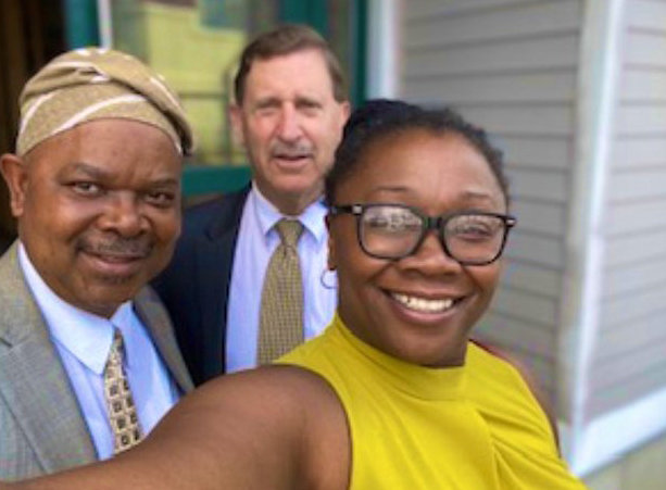 Neil Steinberg, center, president and CEO of the Rhode Island Foundation, with Muraina &ldquo;Morris&rdquo; Akinfolarin, left, and Angela Ankoma, executive vice president at the Rhode Island Foundation, right, on a recent visit to the Oasis International center.