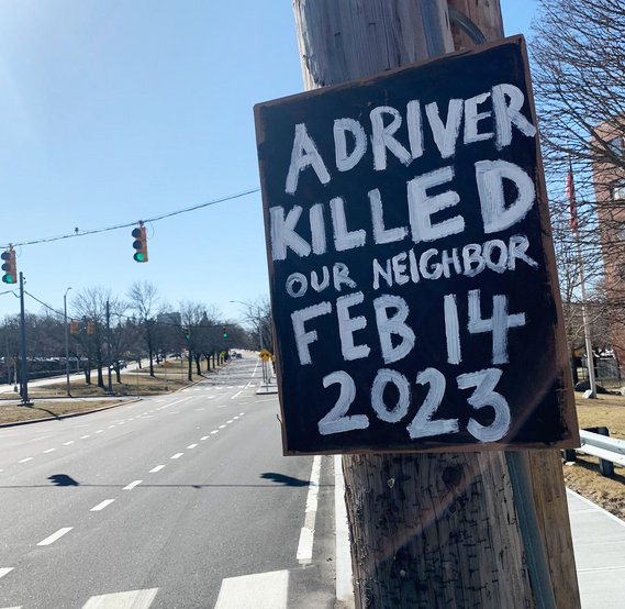 A sign marking the intersection on North Main Street in Providence where a pedestrian was killed, a day before Judge Richard Licht was struck and injured while attempting to cross Smith Street across from the State House.