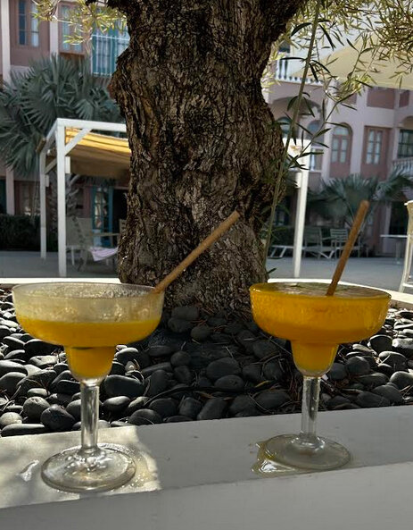 Two for one mango margaritas at a pool side bar in Aruba.