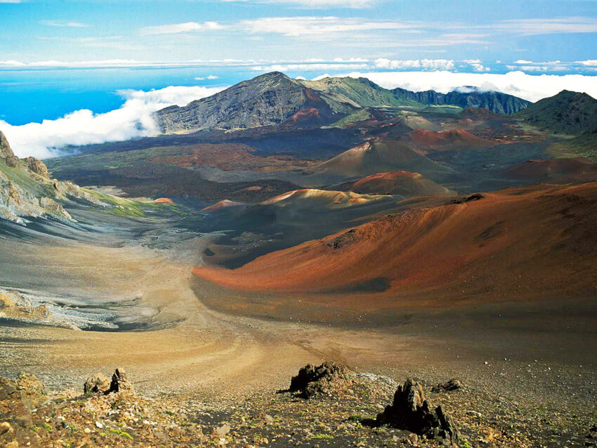 The view from the Sliding Sands Trail into the dormant volcanic crater, Haleakala, on the island of Maui. The destruction of Lahaina on Maui from a fast-moving wildfire, caused by the climate urgency, is a reminder how vulnerable the planet has become.