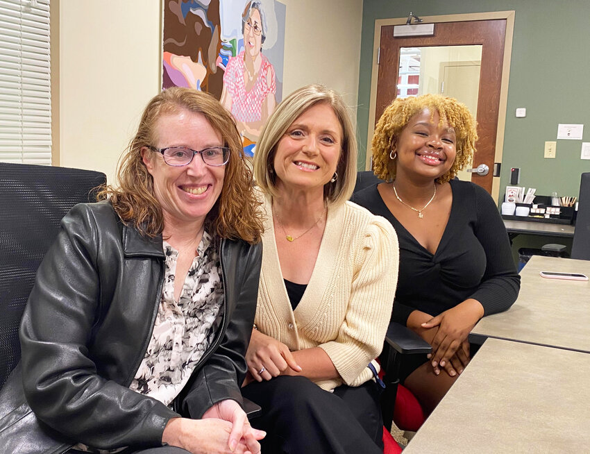 Nancy Wolanski, Director of the Nonprofit Resource Center, left, Cortney Nicolato, President and CEO, United Way of Rhode Island, and Jully Myrthil, United Way Intern.