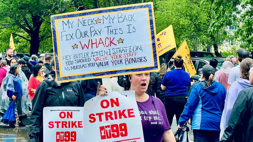 Striking workers from Butler Hospital on the picket line on Blackstone Boulevard in Providence, another sign that the health care delivery system is in crisis.