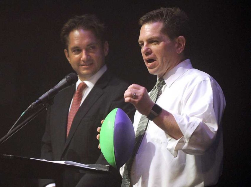 Jon K. Rust observes as brother Rex Rust gets ready to toss a football into the balcony at Southeast Missouri State University&rsquo;s River Campus in Cape Girardeau during the 2018 Semoball Awards. Rex&rsquo;s throw was an annual tradition at the high school sports event. (Photo credit: Southeast Missourian)