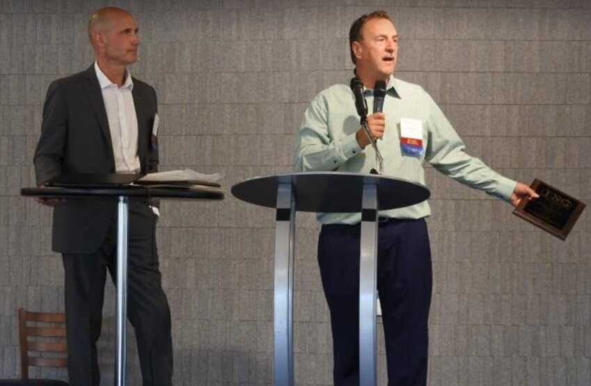 Addressing the attendees at September&rsquo;s ING Conference are (l to r) Richard Reinhart, incoming ING president, and Wayne Pelland, outgoing ING president.